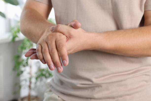 istock Man applying hand cream at home, closeup 1737718114