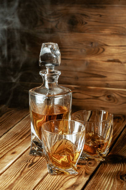 istock glasses with cognac, whiskey stand on the bar 1737719161