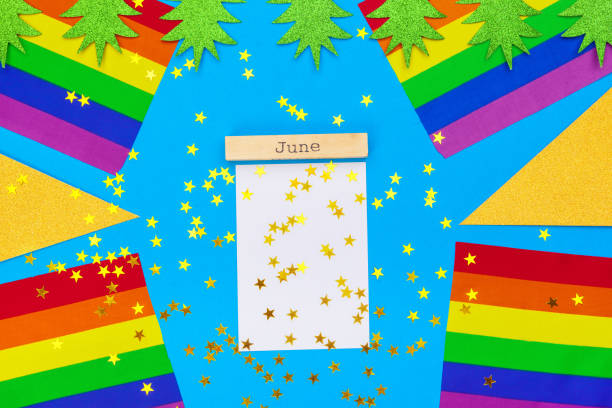 istock Gay pride flag on wooden table 1737727255
