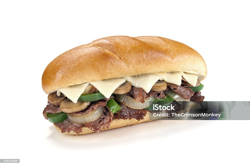 Fully Loaded Philly Cheese Steak Sandwich Aspirational shot of a fully loaded Philly cheese steak sandwich with peppers, onions, mushrooms, and cheese, isolated on white with shadow. Philadelphia Cheese Steak Stock Photo