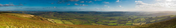 istock Sunlight on green pastoral panorama 173773214