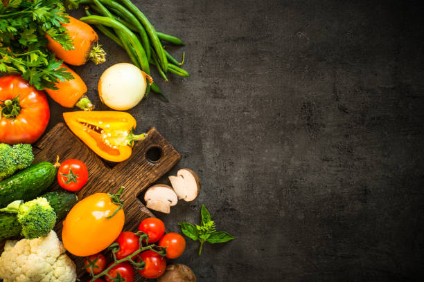 istock Healthy food background on black table. 1737736588