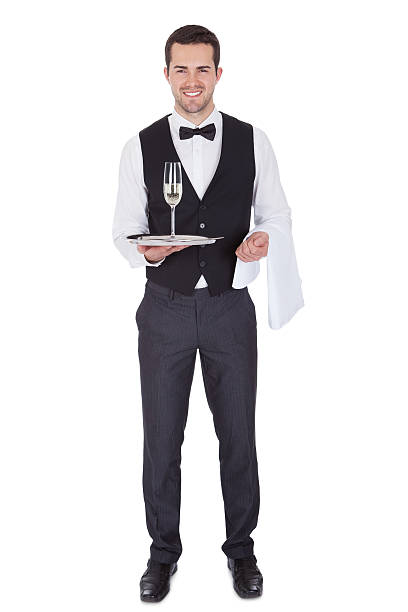 retrato de un joven alegre de mayordomo - waiter butler champagne tray fotografías e imágenes de stock