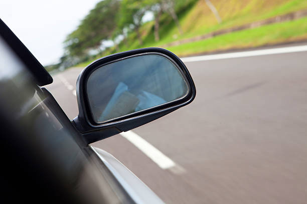 istock car driving at high speed on empty road 173773860