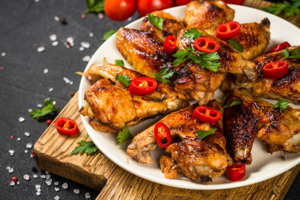 istock Grilled chicken wings with barbecue sauce. 1737742521