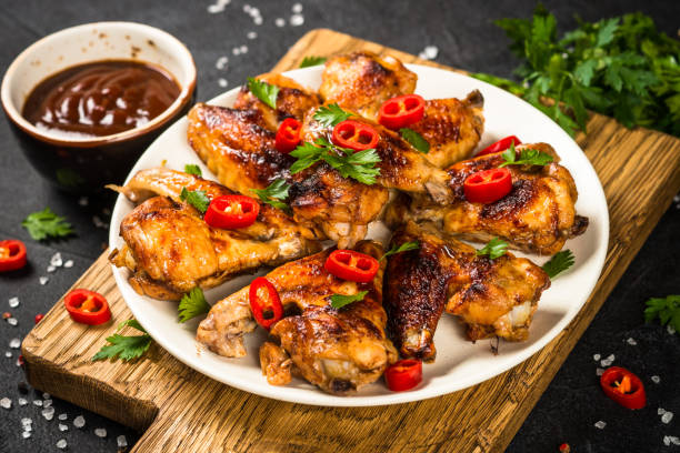 istock Grilled chicken wings with barbecue sauce. 1737742856