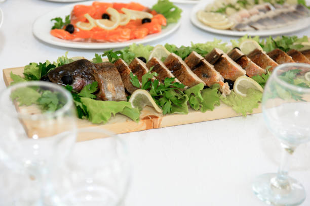 istock A table with food and stuffed pike. 1737758095