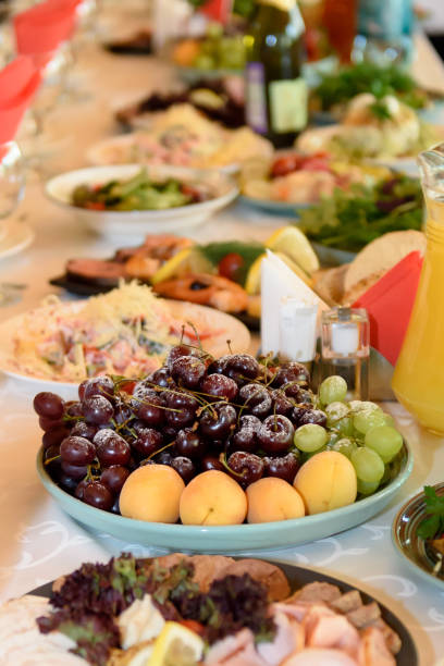 istock Salads and snacks in the assortment on the festive table. 1737771425