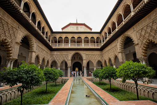 Granada, Spain - October 3, 2013: General view of the Generalife with its famous fountain and garden. Alhambra de Granada. UNESCO World Heritage Site