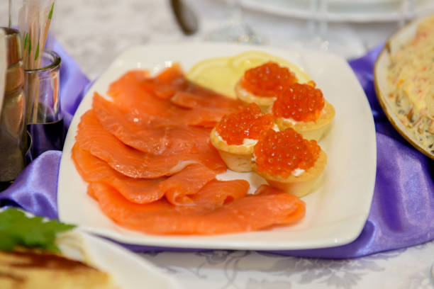 istock Salads and snacks in the assortment on the festive table. 1737776342