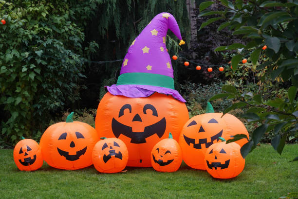 istock inflatable Halloween decorations on front lawn of house 1737778412