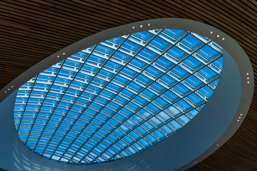 Majestic glass and iron ceiling with a clock from the station of France, barcelona, spain