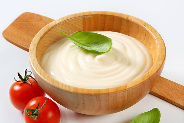 istock Creamy sauce in wooden bowl 173779215