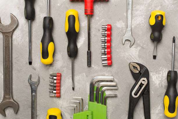 istock Set of tools on concrete background, top view 1737825946