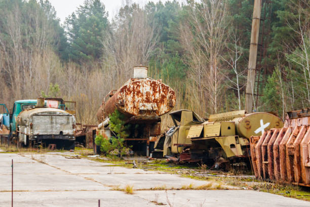 istock Old rusty abandoned damaged trucks in Chernobyl exclusion zone, Ukraine 1737834962