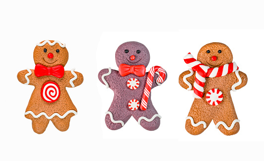 Gingerbread cookies. Christmas decorations. Cut out on white background.
