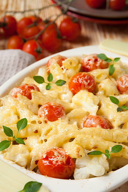 penne pasta with cheese and tomato