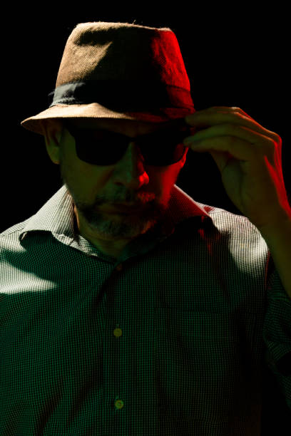 istock Mysterious man wearing hat and sunglasses. 1737909263