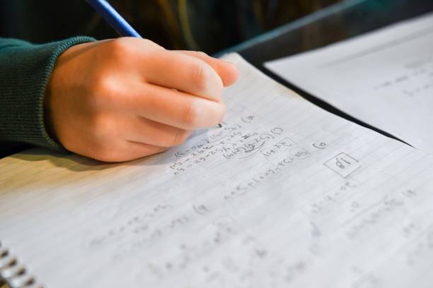 istock Teenage girl doing her homework 1737941131