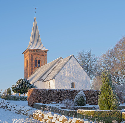 Danish Church in wintertime - dressed in frost and snow