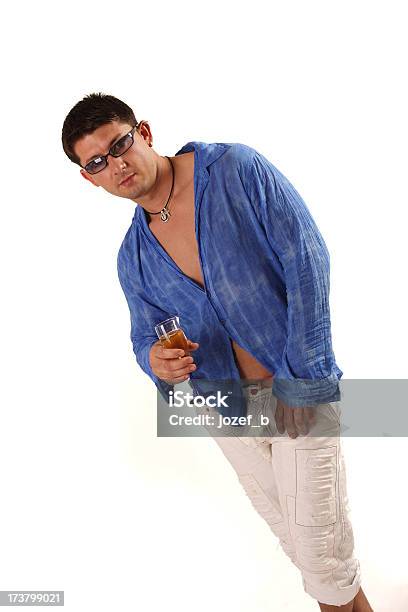 Easygoing And Champaign Drinking Stock Photo - Download Image Now - Muscular Build, Adult, Adults Only