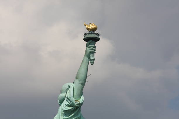 istock statue of liberty holding a torch 173799374