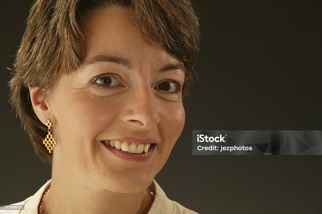 headshot of smiling woman headshot of happy smiling middle aged woman 40-49 Years Stock Photo