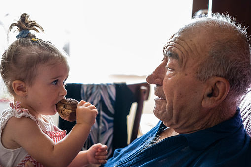 Multigenerational family at home. Sharing family moments and caring for each other.