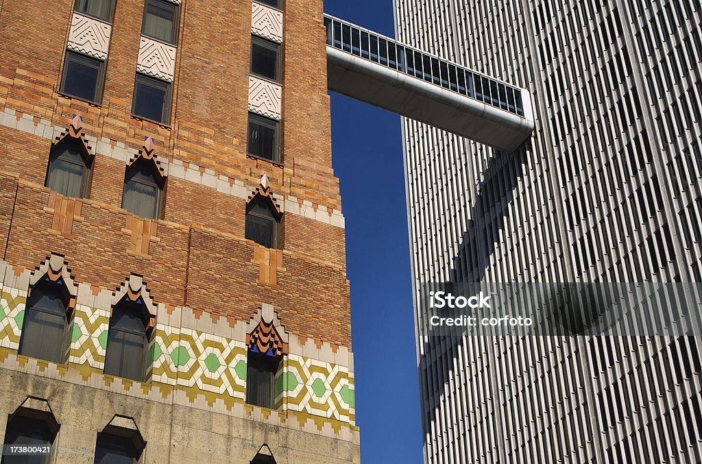 Art Deco Building next to Modern in Detroit Skywalk connecting the historic Guardian Building (1929) and the neighboring One Woodward Avenue in Downtown Detroit, Michigan, USA; the architect of the modern structure on the right-hand side is Minoru Yamasaki Detroit - Michigan Stock Photo