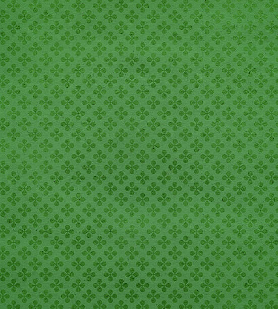 papel texturizado com trevo verde - st patricks day clover four leaf clover irish culture - fotografias e filmes do acervo