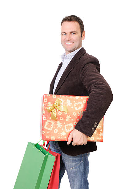 uomo con shopping natalizio - male1 foto e immagini stock