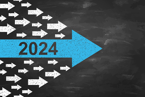 2024 New Year Leadership Concepts on Blackboard Background