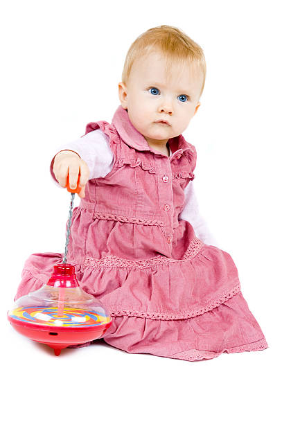 Baby playing stock photo