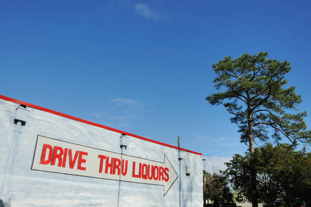 istock Drive Through Liquor Store Sign on Building 173802546