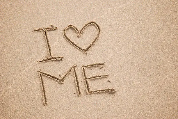 Message in the sand stands for a whole generation: I Heart Me