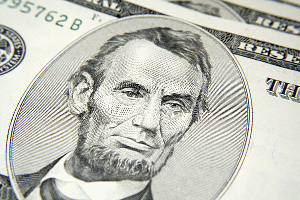 istock American Five dollar bills - cash 173802848