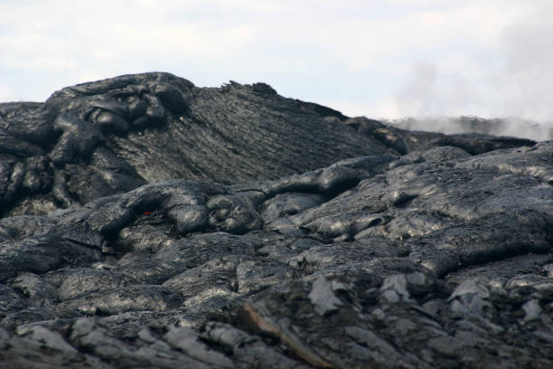 istock volcanic landscape Hawaii molten liquid basalt lava volcano eruption 173804274