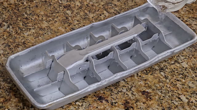Filling a very old ice cube tray