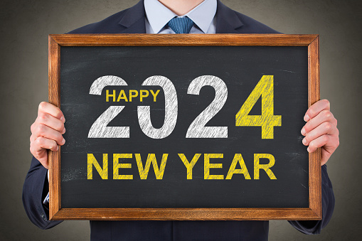 Happy New Year 2024 on Blackboard Background