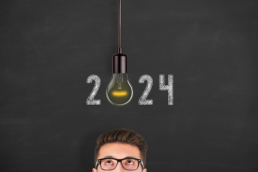 New Year 2024 New Idea Concepts on Blackboard Background