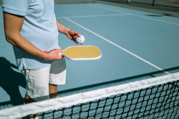 istock Adults Playing Pickleball on a Public Court 1738085470