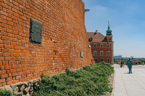 Warsaw, Poland - July 16, 2023. Warsaw Old Town red brick wall on Castle Square