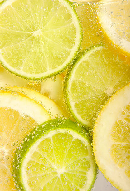 istock lemon and limes in fizzy water 173812240