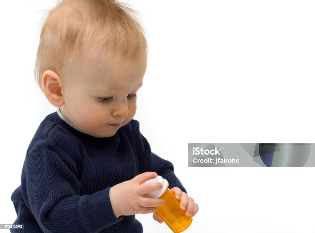Bebê com o frasco do medicamento com espaço para texto - Royalty-free Frasco de Comprimidos Foto de stock