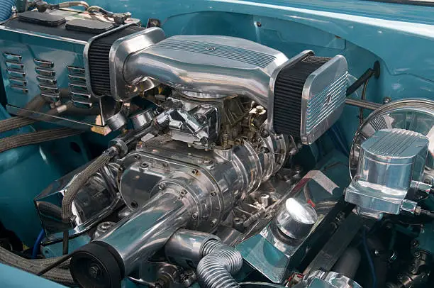 Supercharged engine of an old muscle car.