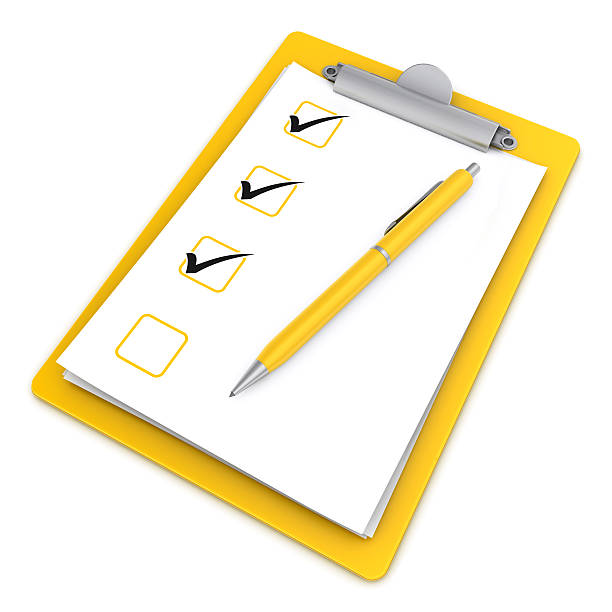 istock ticks on clipboard and pen 173813184