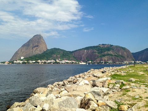 Rio de Janeiro, Brazil- March 25, 2013: Rio de Janeiro,  is the capital of the estado (state) of Rio de Janeiro, Brazil. It is located on the Atlantic Ocean, in the southeastern part of the tropical zone of South America, and is one of the world’s most beautiful and interesting urban centres.  Here is  a must-see attraction: the Sugarloaf Mountain, one of Brazil’s most iconic landmarks and a symbol of Rio de Janeiro’s beautiful natural surroundings.