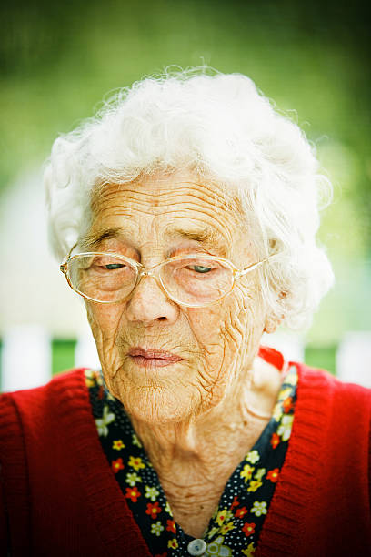 triste senior lady - aging process affectionate vitality awe foto e immagini stock