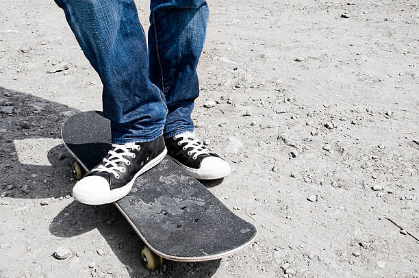 istock Jeans, trainers and skateboard 173816797