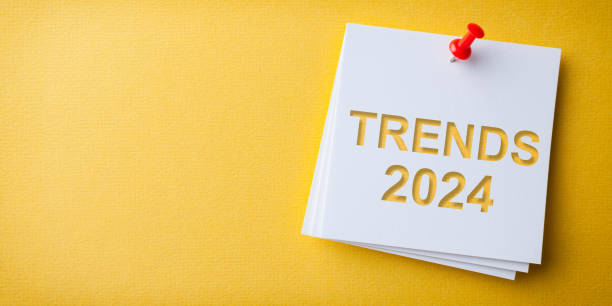 istock Trends 2024 Word in White Sticky Note on Yellow Cardboard Background 1738169791